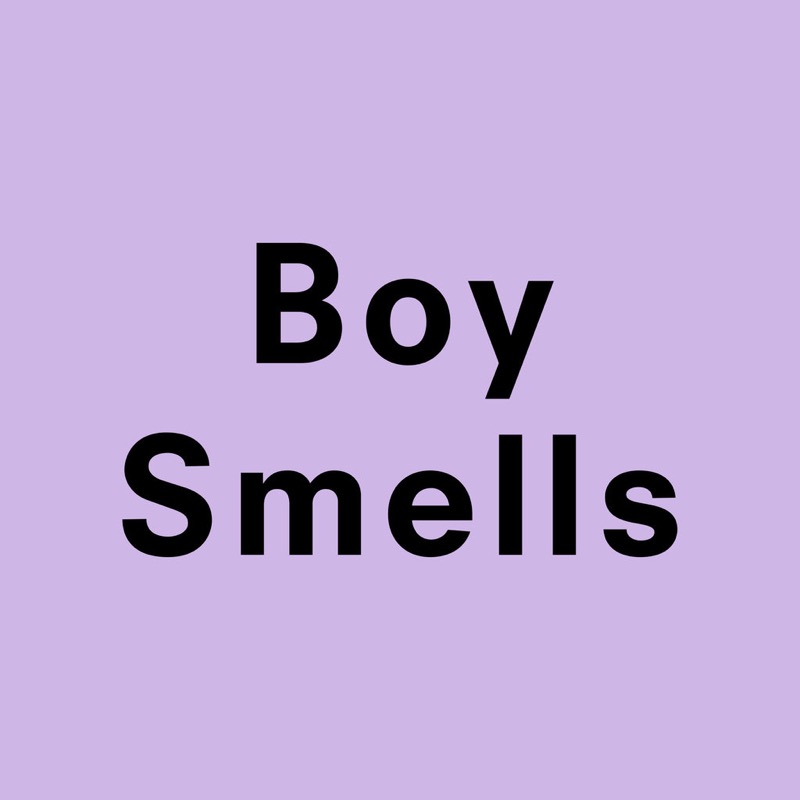 Boy Smells Candle